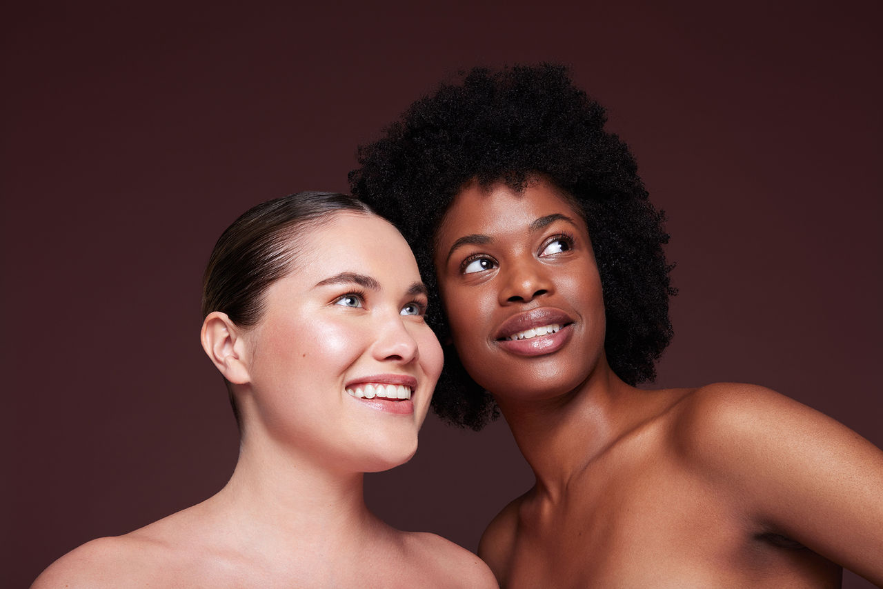 Two women looking up and smiling